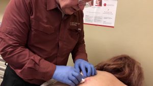 Drainage of a back abscess
